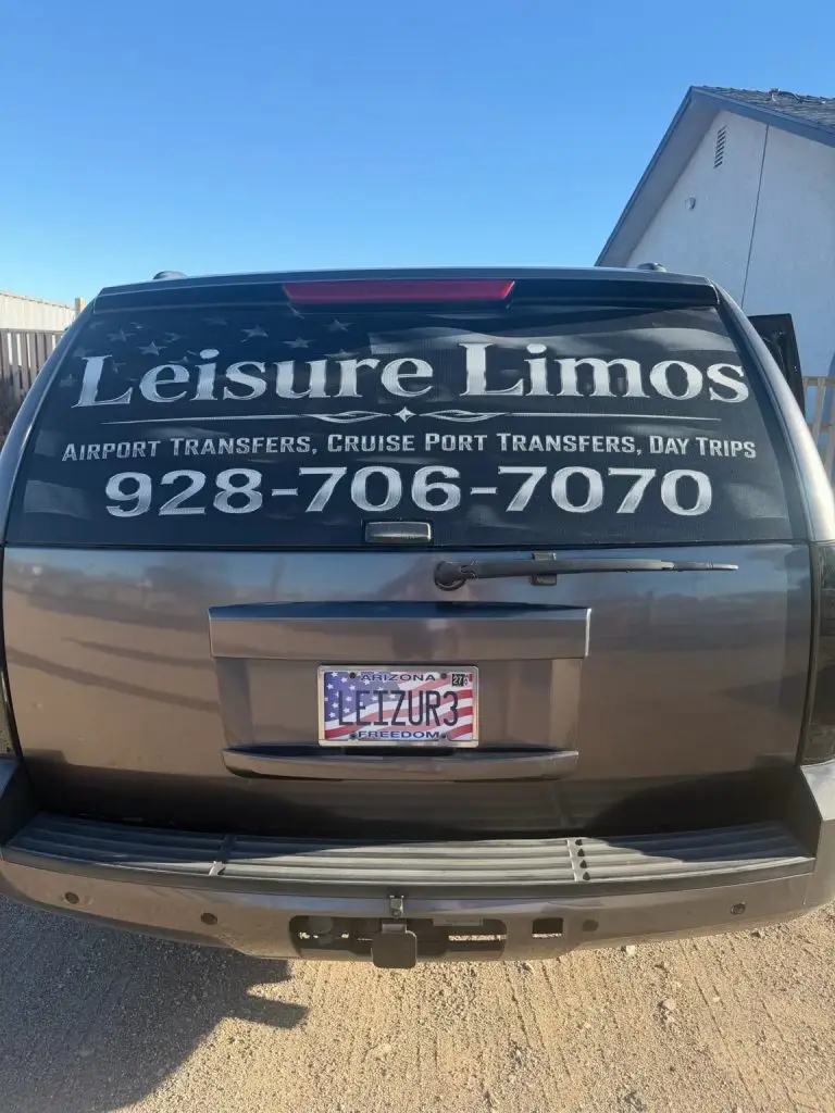 Jackson GMC SUV rear exterior with Leisure Limos branding